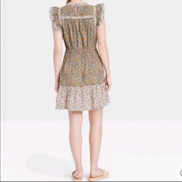 NWT Universal Thread Green Floral Linen Blend
Floral Flutter Sleeveless Dress - Picture 3 of 6